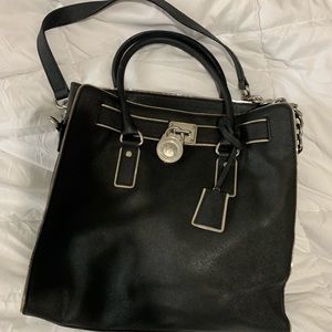 3 Michael Kors bags and one coach bag